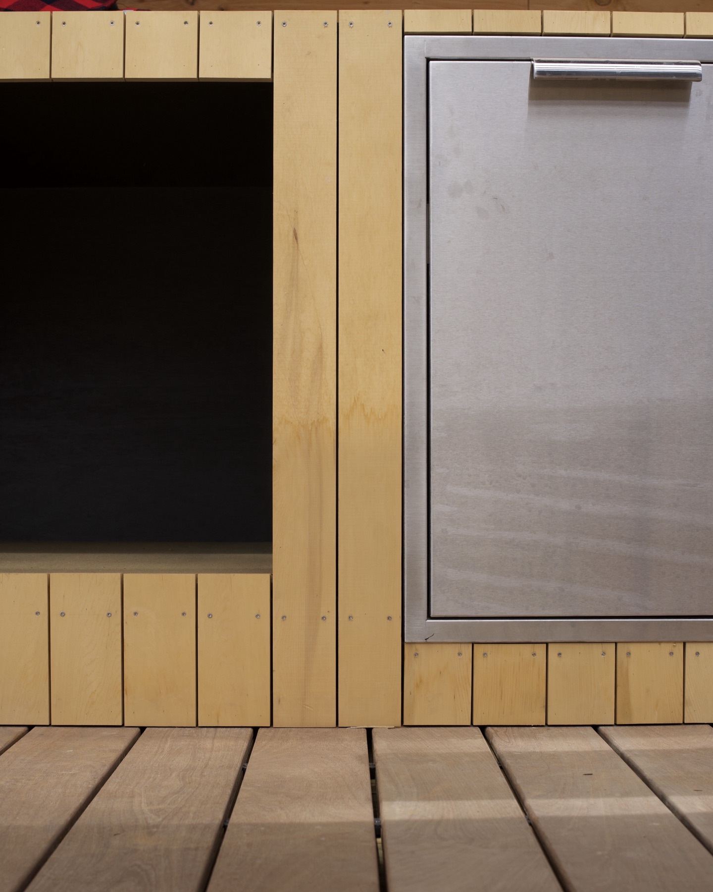 Custom outdoor kitchen cabinet with stainless access door